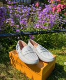 Mocassins Gommino Tod's en cuir blanc clouté